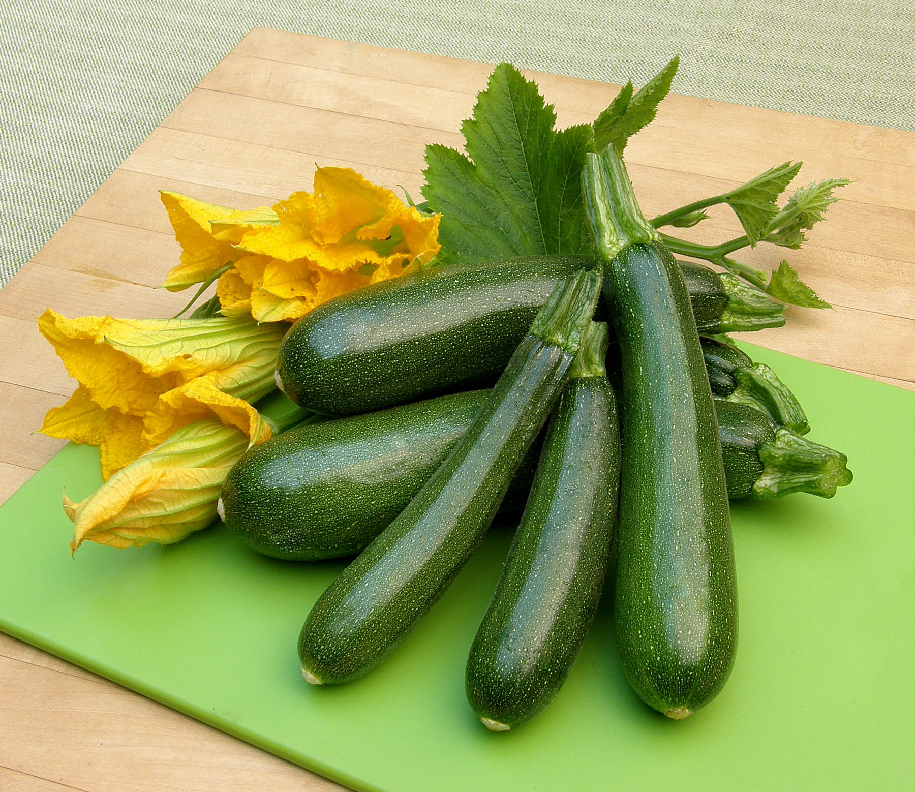 Climbing courgette vegetable plants suitable for outdoor gardens and raised beds.